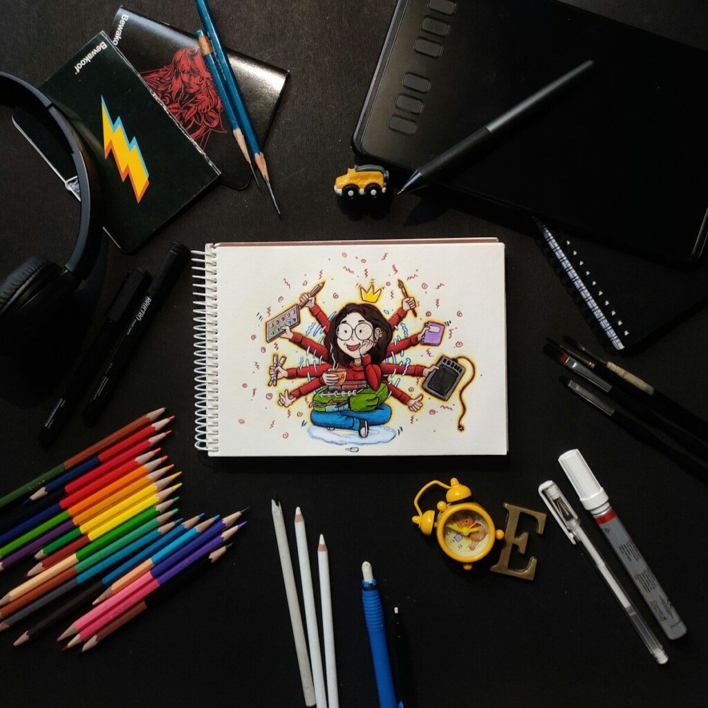 Drawing of a multi-armed person surrounded by art supplies.