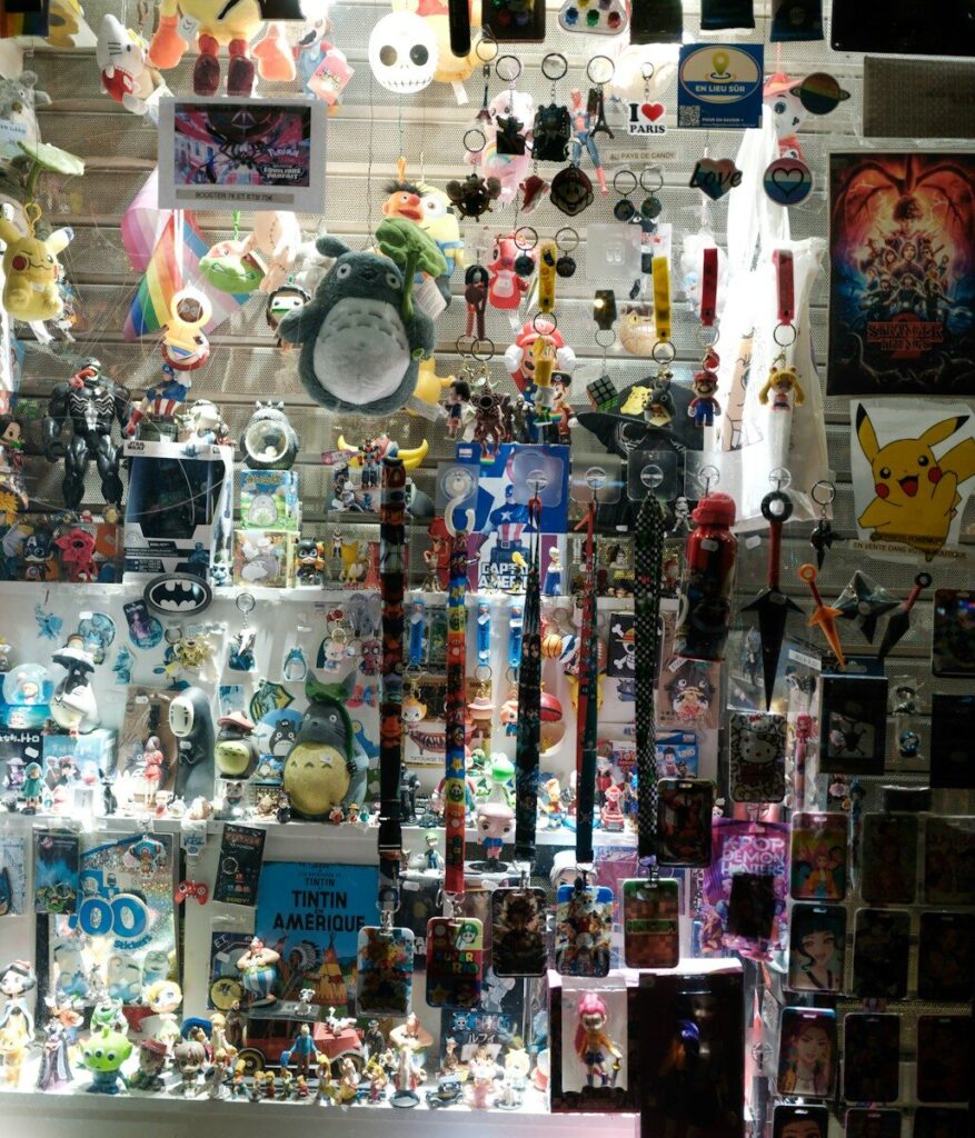 Wall display of various anime and pop culture merchandise.
