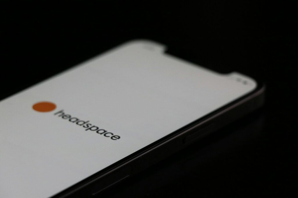 a close up of a cell phone on a table