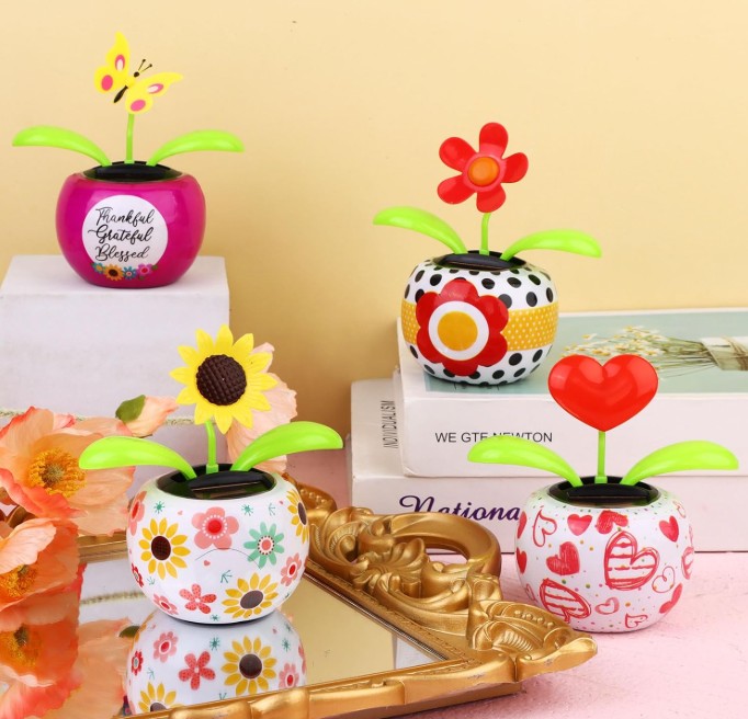 Weird and Fun Finds; solar dancing flower