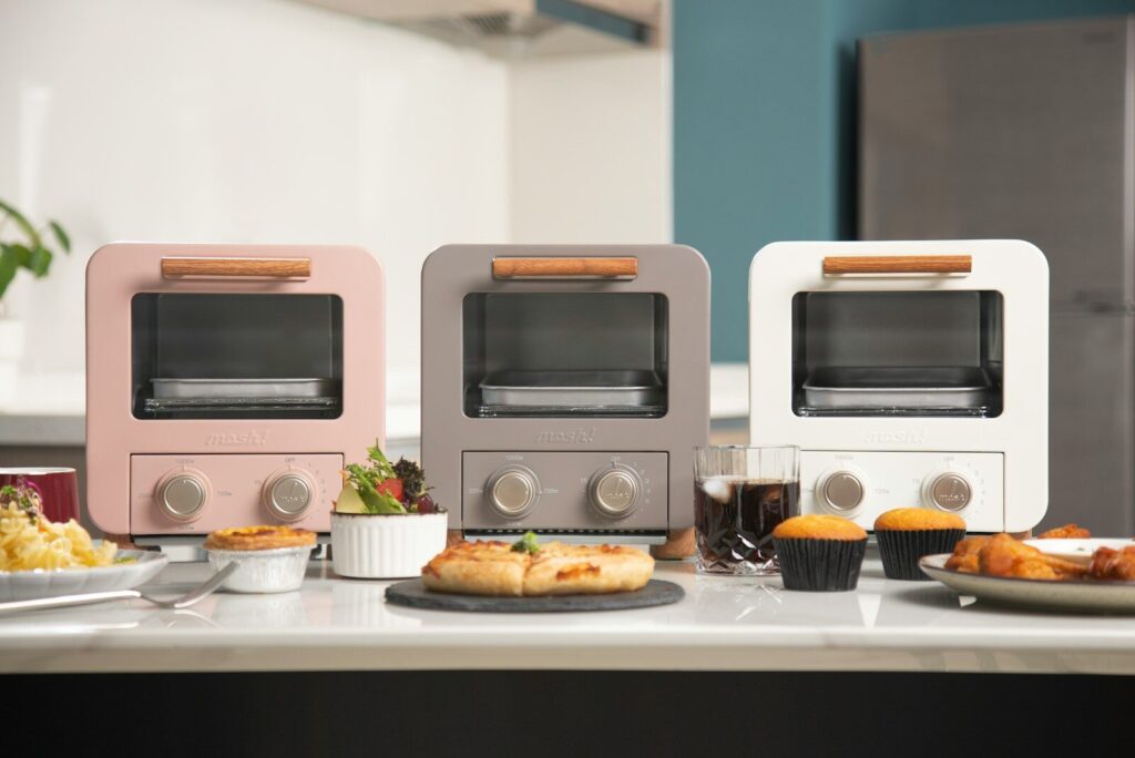 Best Air Fryers for Busy Families; a couple of toasters sitting on top of a counter