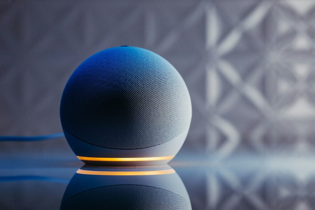 a blue ball on a black surface; AI Is Changing Everyday Life